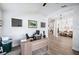 Spacious office showcases wood flooring and an open layout with views of the dining room at 967 Hunters Meadow Ln, Lakeland, FL 33809