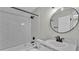 Bathroom featuring subway tile surround, modern fixtures, and a stylish vanity at 980 S Mill Ave, Bartow, FL 33830