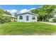 Quaint home with freshly cut lawn, new paint, and charming window boxes at 980 S Mill Ave, Bartow, FL 33830