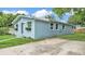 Charming single story home features a well-manicured lawn and driveway at 980 S Mill Ave, Bartow, FL 33830