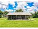 Large metal garage perfect for storing machinery, vehicles, and other equipment at 10 Webb Rd, Winter Haven, FL 33881