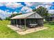 Well-organized storage garage with ample space for vehicles, equipment and tools, with a metal roof at 10 Webb Rd, Winter Haven, FL 33881