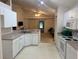 Bright kitchen featuring modern appliances and an open layout, ideal for cooking and entertaining guests at 1011 Tequesta Trl, Lake Wales, FL 33898