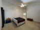 Main bedroom with vaulted ceilings, lots of natural light, and neutral paint at 1011 Tequesta Trl, Lake Wales, FL 33898