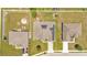 Birds eye view of a neighborhood featuring a home with solar panels, a playground, and lush lawns at 1028 15Th Ne St, Winter Haven, FL 33881