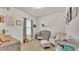 Bedroom with a crib, changing station, and soft, neutral tones at 1028 15Th Ne St, Winter Haven, FL 33881