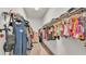 Walk-in closet with ample hanging storage and shelving at 1028 15Th Ne St, Winter Haven, FL 33881