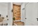 Stylish hallway featuring wood accent wall, adding character and warmth to the home's interior at 1028 15Th Ne St, Winter Haven, FL 33881