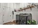 Well-organized laundry room with modern washer and dryer, plus ample storage space at 1028 15Th Ne St, Winter Haven, FL 33881