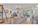 Inviting living room area featuring an open layout, comfortable seating, and access to outdoor patio at 1028 15Th Ne St, Winter Haven, FL 33881