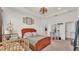 Serene main bedroom featuring neutral tones, natural light, and a calming atmosphere at 1028 15Th Ne St, Winter Haven, FL 33881