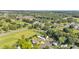 Wide aerial shot of a cozy neighborhood nestled among mature trees at 1050 Reynolds Rd, Lakeland, FL 33801
