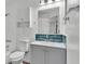 Updated bathroom with gray vanity, white countertop and blue tiled backsplash at 1050 Reynolds Rd, Lakeland, FL 33801