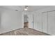 A clean and bright bedroom with wood-look floors and a ceiling fan for comfort at 1050 Reynolds Rd, Lakeland, FL 33801