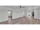 Open living space featuring new flooring, connecting seamlessly to other areas of the house at 1050 Reynolds Rd, Lakeland, FL 33801