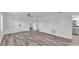 Bright and airy living room with modern flooring and neutral tones throughout the space at 1050 Reynolds Rd, Lakeland, FL 33801