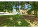 This home offers a large backyard with a patio and fire pit, perfect for outdoor activities at 114 Ed Padgett Rd, Lakeland, FL 33809