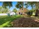 This beautiful backyard features a fire pit and patio, ideal for outdoor activities and relaxation at 114 Ed Padgett Rd, Lakeland, FL 33809