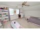 Spacious bedroom with bright natural light and large windows at 114 Ed Padgett Rd, Lakeland, FL 33809
