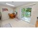 Cozy breakfast nook with sliding glass doors to the backyard, perfect for enjoying meals at 114 Ed Padgett Rd, Lakeland, FL 33809