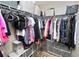 Walk-in closet with ample shelving and hanging space for organized storage at 114 Ed Padgett Rd, Lakeland, FL 33809