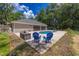 Backyard features a pool, patio, and plenty of space for outdoor activities at 13 Count Fleet Dr, Ocala, FL 34482