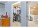 Large walk-in closet with shelving and ample space for clothing and personal items at 13 Count Fleet Dr, Ocala, FL 34482