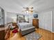 Spacious bedroom featuring hardwood floors, neutral walls, and ample closet space at 1308 Timberidge N Loop, Lakeland, FL 33809