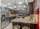 Spacious kitchen with granite countertops, stainless steel appliances and dark wood cabinetry at 1308 Timberidge N Loop, Lakeland, FL 33809