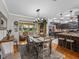 Cozy kitchen and dining area with dark cabinets and bar stool seating at 1308 Timberidge N Loop, Lakeland, FL 33809