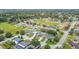 Neighborhood aerial showcasing lush green spaces and a variety of single-Gathering homes at 1420 Meadows Pond Dr, Bartow, FL 33830