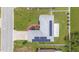 Top-down aerial view showcasing solar panels, two-car garage, and well-kept yard at 1420 Meadows Pond Dr, Bartow, FL 33830