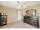 Spare bedroom with neutral walls, large dresser, and ceiling fan at 1420 Meadows Pond Dr, Bartow, FL 33830