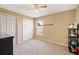 Spare bedroom with neutral walls, double closet, and ceiling fan at 1420 Meadows Pond Dr, Bartow, FL 33830