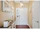 View of the entryway with a console table and decorated with stylish accents at 1420 Meadows Pond Dr, Bartow, FL 33830