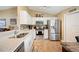 Well-equipped kitchen featuring stainless steel appliances, granite countertops, and ample cabinet space at 1420 Meadows Pond Dr, Bartow, FL 33830
