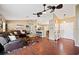 Spacious living room showcasing open floor plan and hardwood flooring at 1420 Meadows Pond Dr, Bartow, FL 33830