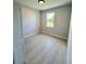 An empty bedroom with a large window at 1683 Sw 3Rd St, Ocala, FL 34471