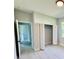 A bedroom with a door to the hallway and a closet at 1683 Sw 3Rd St, Ocala, FL 34471