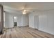 Bright bedroom with wood-look floors and view of bathroom at 1811 Sherwood Hill Dr, Lakeland, FL 33810