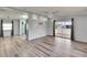 Open concept living room with vinyl plank flooring at 1811 Sherwood Hill Dr, Lakeland, FL 33810