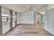 Open living room with light neutral walls and vinyl plank flooring at 1811 Sherwood Hill Dr, Lakeland, FL 33810