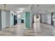 Open-concept living space features light filled rooms and consistent flooring at 1811 Sherwood Hill Dr, Lakeland, FL 33810