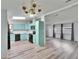 Open-concept living space features light filled rooms and consistent flooring at 1811 Sherwood Hill Dr, Lakeland, FL 33810