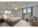 Relaxing main bedroom features a plush bed, ample natural light, and minimalist decor for a serene atmosphere at 1811 Sherwood Hill Dr, Lakeland, FL 33810