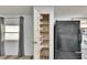 Pantry storage with white metal wire shelves at 1811 Sherwood Hill Dr, Lakeland, FL 33810
