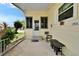 Welcoming porch with seating area; covered access to the house at 1811 Sherwood Hill Dr, Lakeland, FL 33810