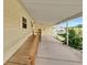 Exterior of home with convenient ramp access under covered carport at 1811 Sherwood Hill Dr, Lakeland, FL 33810