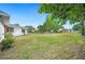 Backyard view of the house, with large yard space and room for landscaping at 1830 Casco, Lakeland, FL 33801