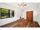 Relaxing bedroom with wood floors, ceiling fan, closet, and an abundance of natural light at 1830 Casco, Lakeland, FL 33801